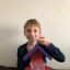 9-летний Михаил Афанасьев, учащийся 6-й гимназии, любит мастерить: эту кормушку для птиц он сделал сам.
