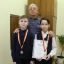 Никита Блинов и Алексей Княгинин с тренером Вячеславом Егоровым. Фото автора