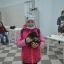 Даша Кутымова (10 лет, из Новочебоксарска) пришла с мамой за щенком, собачку назвали Лордом.