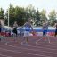 Финиш забега на 400 метров. Победу одерживает Александр Буяновский. Фото Максима Боброва
