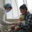 В прививочном кабинете детской поликлиники. Мама Виктория принесла трехмесячную дочурку Анастасию на вакцинацию против коклюша, дифтерии, столбняка и полиомиелита. Фото Марии Смирновой