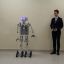 Робот Коля и его создатель робота десятиклассник Роман Сюсюгин. Фото Максима БОБРОВА