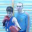 Илья Дугин (12 лет, 6 “а” школы № 14) с тренером  Андреем Ананьевым. Фото из личного архива