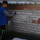 Волонтеры Новочебоксарска закрасили надписи о наркотиках на фасадах зданий